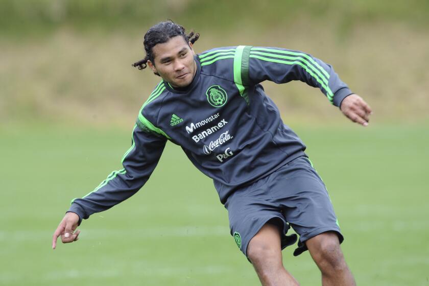 Mexico's Carlos Pena trains with his teammates in preparation for their upcoming World Cup qualifying soccer match against New Zealand, at Dave Farrington Park, in Wellington, New Zealand, Sunday, Nov. 17, 2013. (AP Photo/SNPA, Ross Setford) NEW ZEALAND OUT