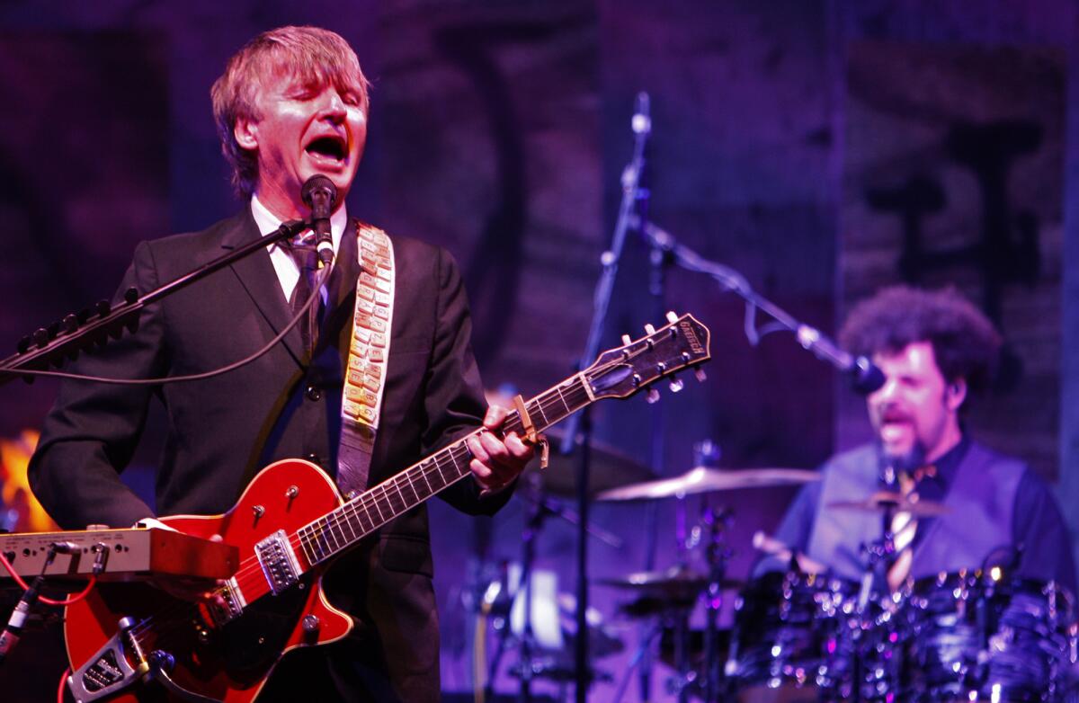 Neil Finn, left, shown with Crowded House drummer Matt Sherrod during a 2010 concert in Los Angeles, is returning to L.A. for a solo show at Largo.