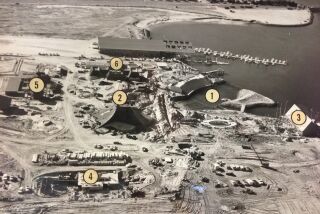 Three months before opening, this December 1963 aerial shows SeaWorld construction in high gear. The numbers correspond to (1) stadium-lagoon; (2) underwater theater; (3) Polynesian-style lounge building; (4) pearl diving display; (5) public patio area; (6) four-tank Reef Building.