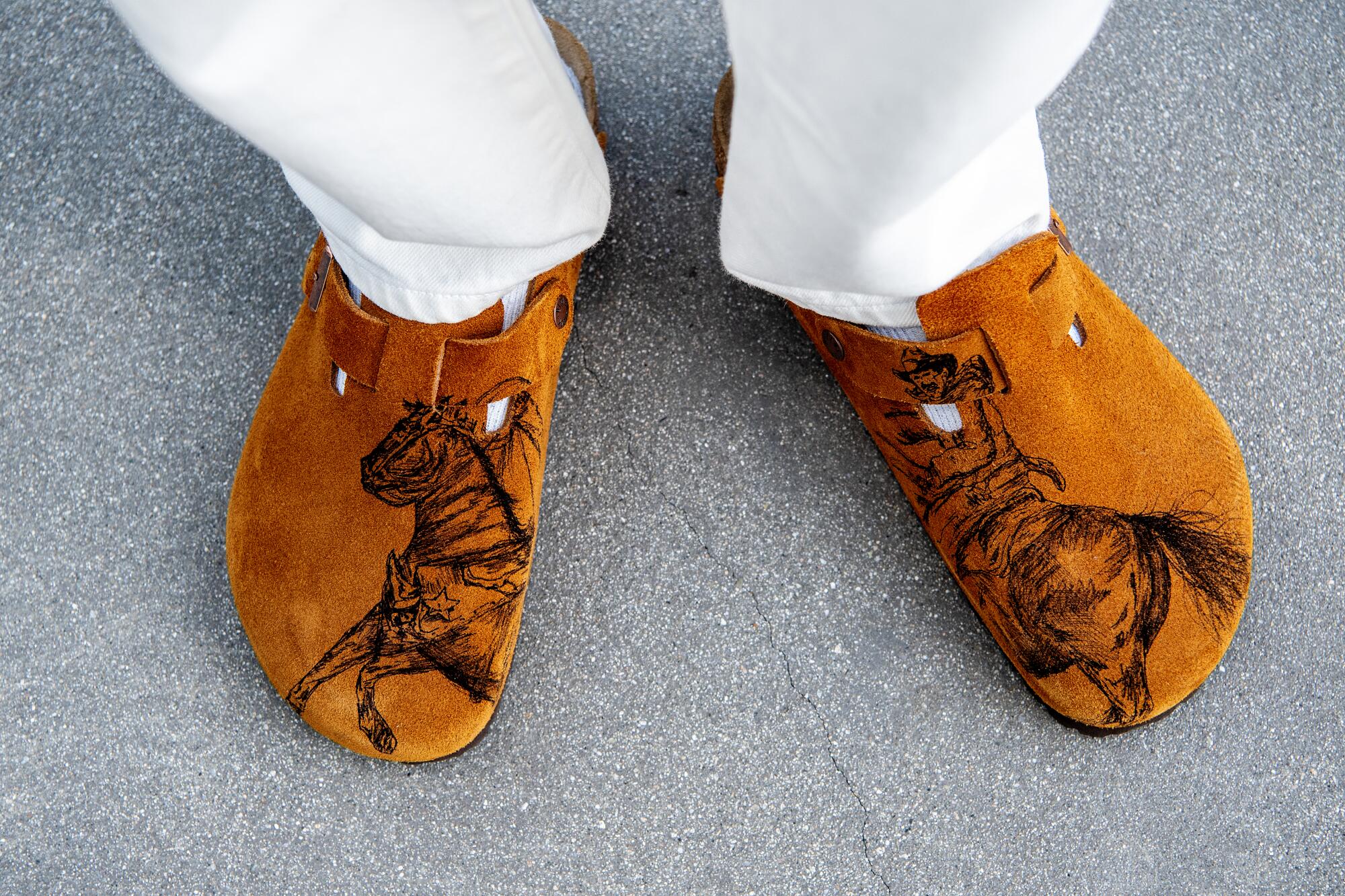 Bryant Giles in Birkenstock X Basketcase Gallery clogs.