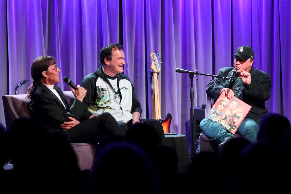 Mark Lindsay of Paul Revere & the Raiders, left, Quentin Tarantino and David Wild in conversation at the Grammy Museum on Wed., Oct. 2.