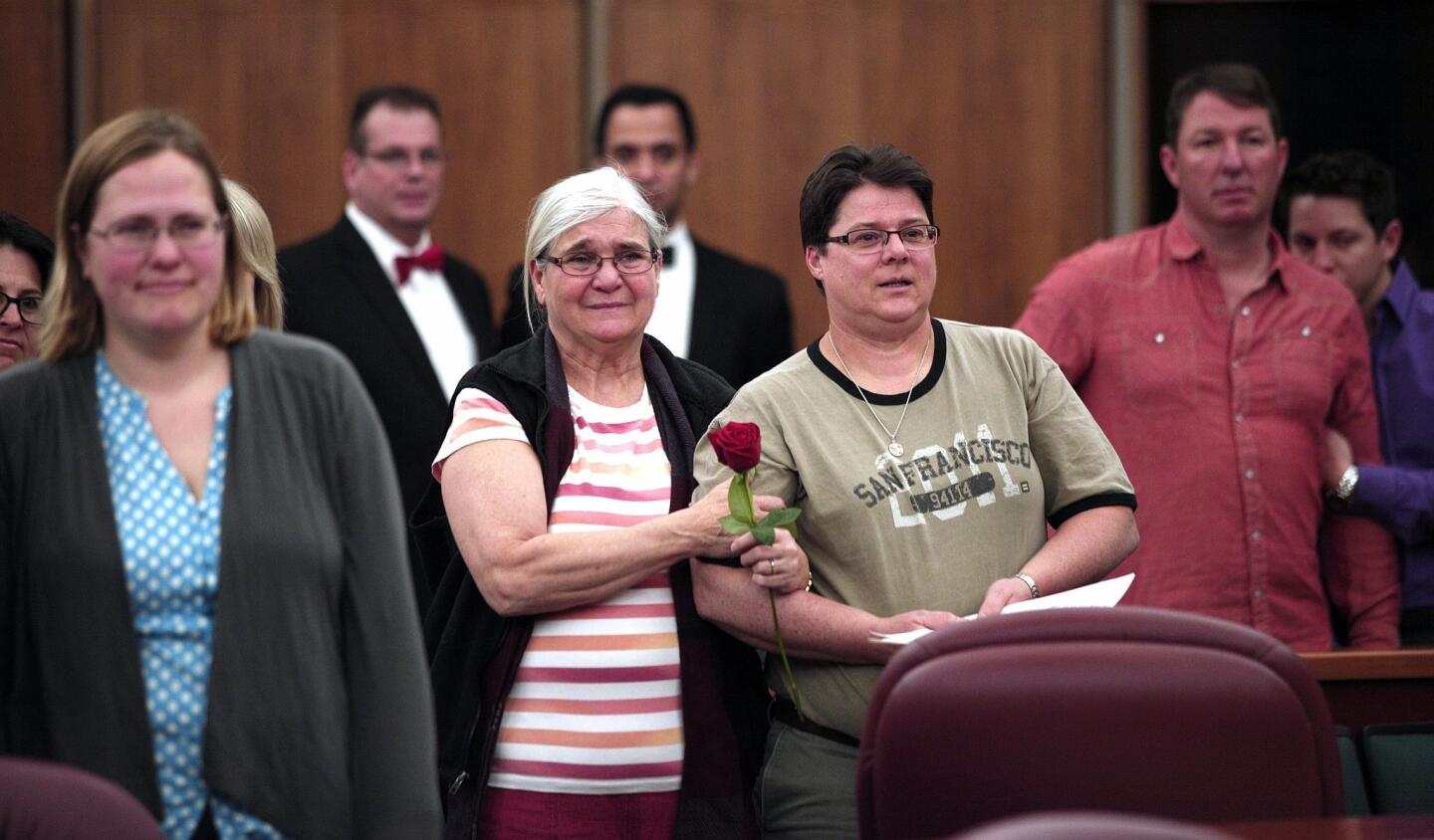 Same Sex Couples Receive Marriage Licenses Day After Judge Strikes Down State's Ban On Gay Marriages
