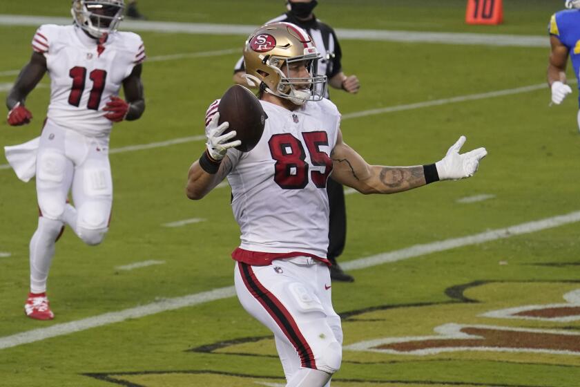 San Francisco 49ers tight end George Kittle (85) celebrates after scoring a touchdown.