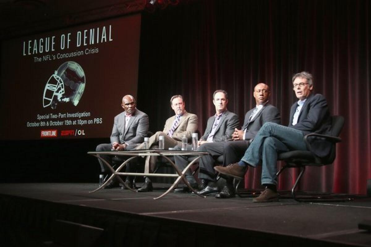 NFL Hall of Famer Harry Carson, investigative reporter and author Mark Fainaru-Wada, journalist and ESPN writer Steve Fainaru, senior coordinating producer at ESPN Dwayne Bray and filmmaker Michael Kirk speak onstage during the "League of Denial: The NFL's Concussion Crisis" panel at the 2013 Summer Television Critics Assn. press tour.