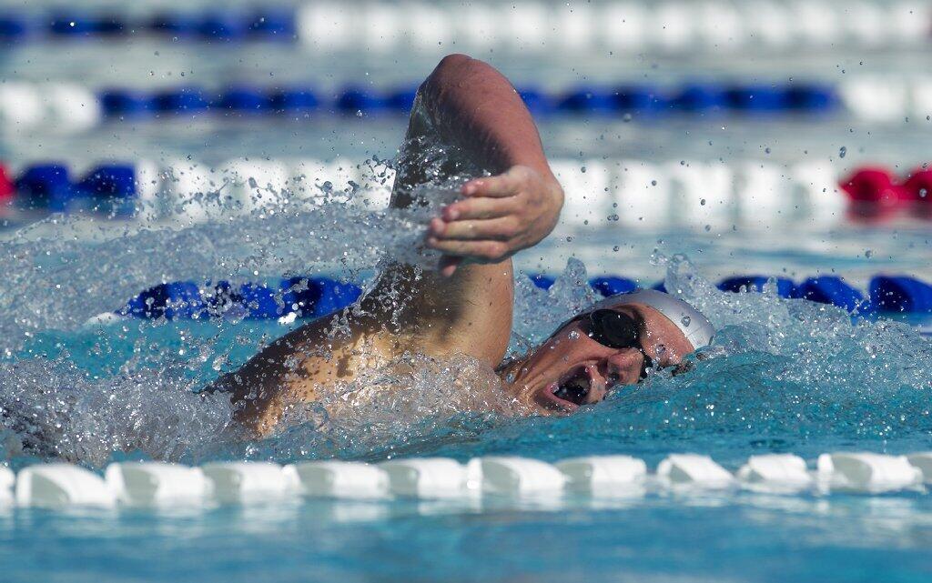 Newport Harbor High's Nick Halphide competes in the 200-yard freestyle against Los Alamitos.