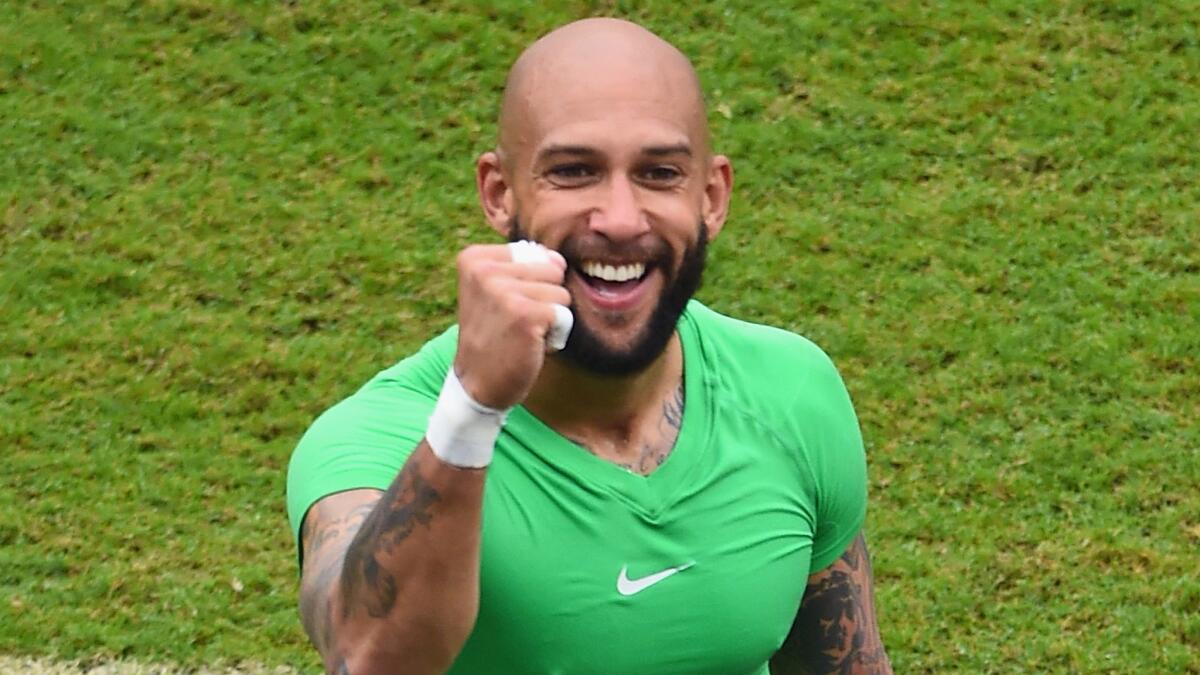U.S. goalkeeper Tim Howard celebrates after the team advanced to the Round of 16 at the World Cup following a 1-0 loss Germany on Thursday.