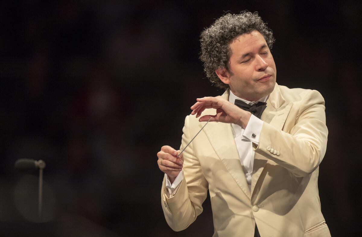 Gustavo Dudamel celebrates his 10th anniversary as artistic and music director of the LA Phil in a concert at the Hollywood Bowl on Thursday.