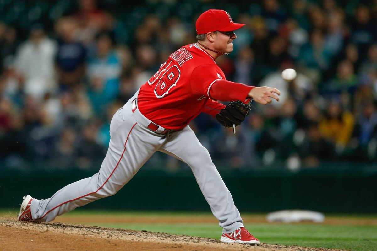 Angels reliever Joe Smith pitches against Seattle on Sept. 15.