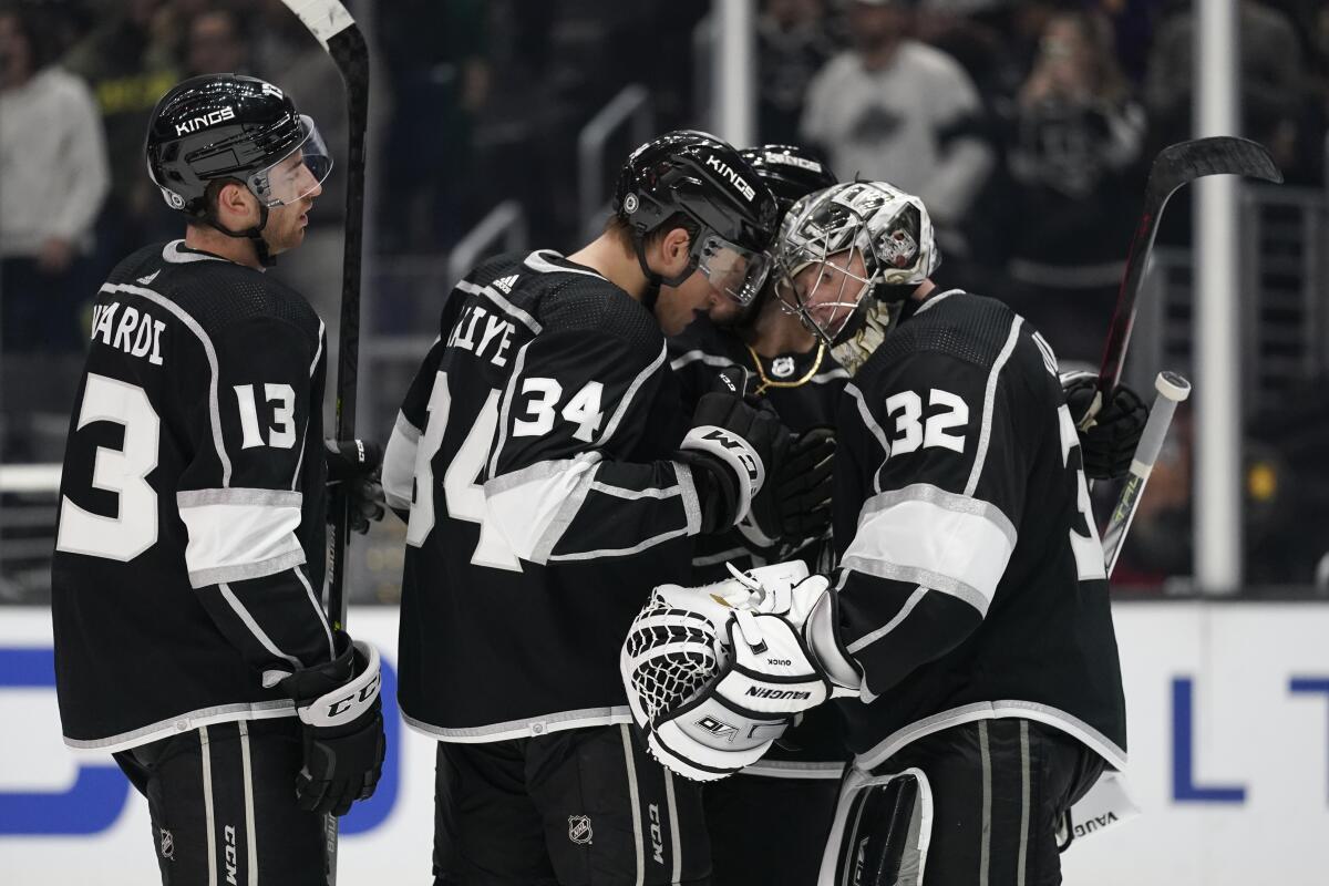 The Kings celebrate after they won 4-2 against the Tampa Bay Lightning at Crypto.com Arena.