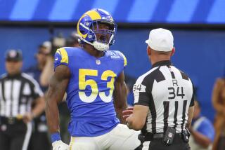 Los Angeles, CA - November 13: Rams inside linebacker Ernest Jones, #53, celebrates a tackle.