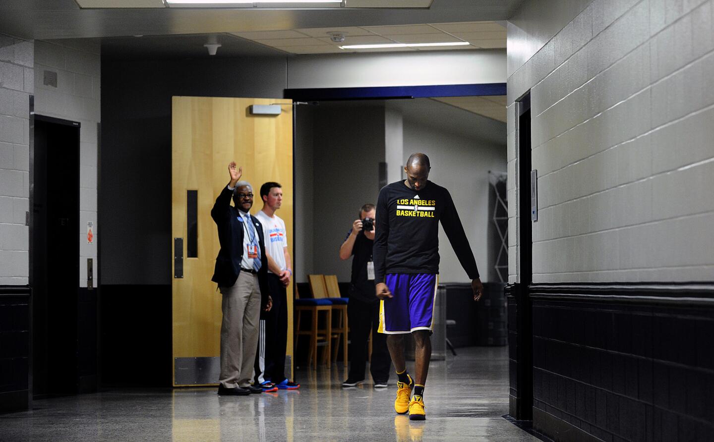 Kobe Bryant walks the hallway as he comes back out to the court during halftime against the Thunder in Oklahoma City on April 11.