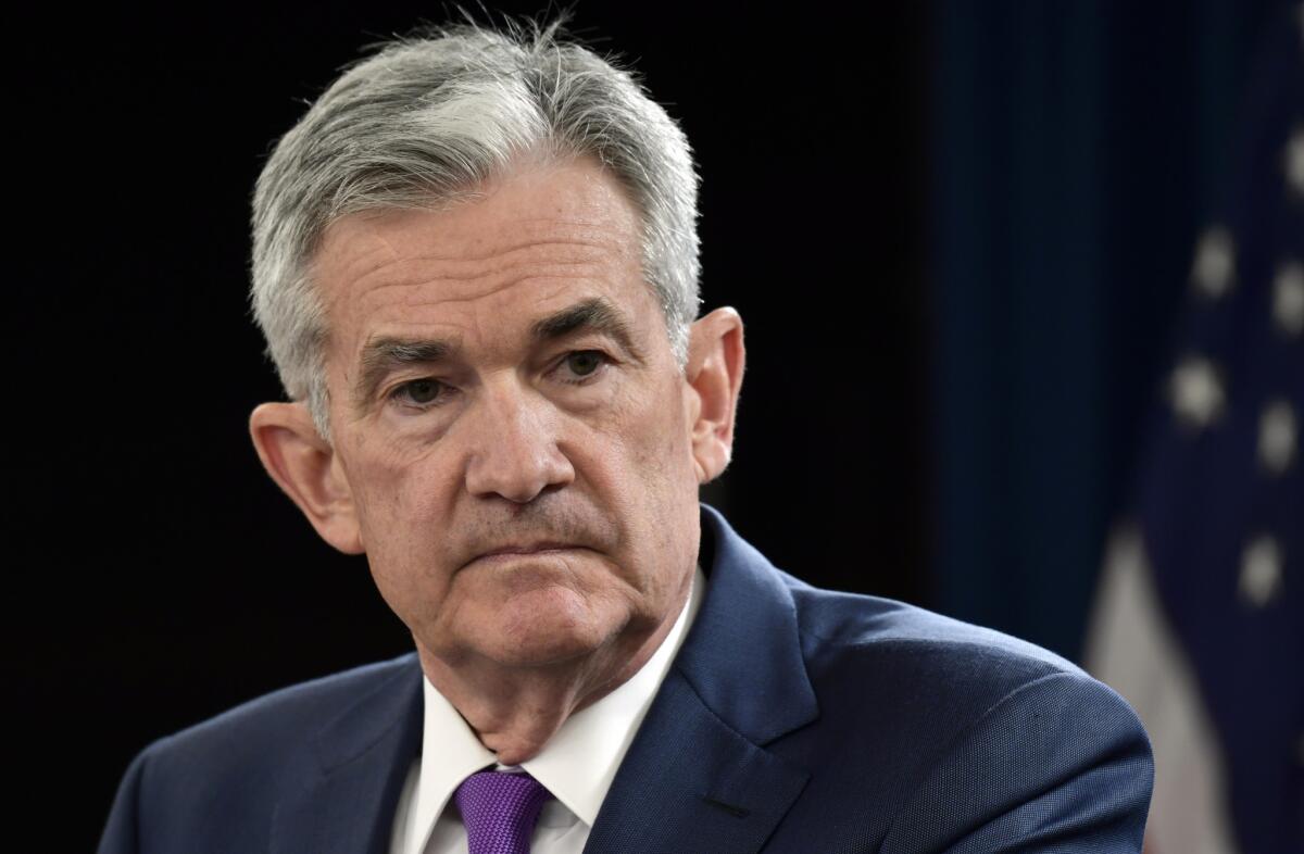 Federal Reserve Chairman Jerome H. Powell, listening to a question at a September news conference in Washington, has been a frequent target of President Trump's attacks.