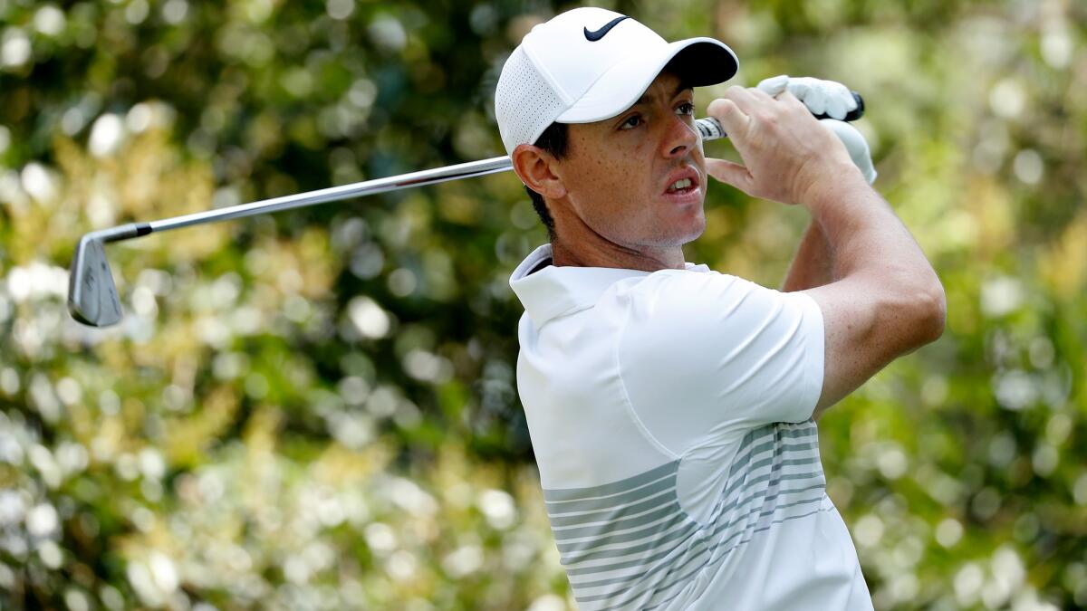 Rory McIlroy watches his tee shot at No. 12 during the first round of the Mexico Championship on Thursday.