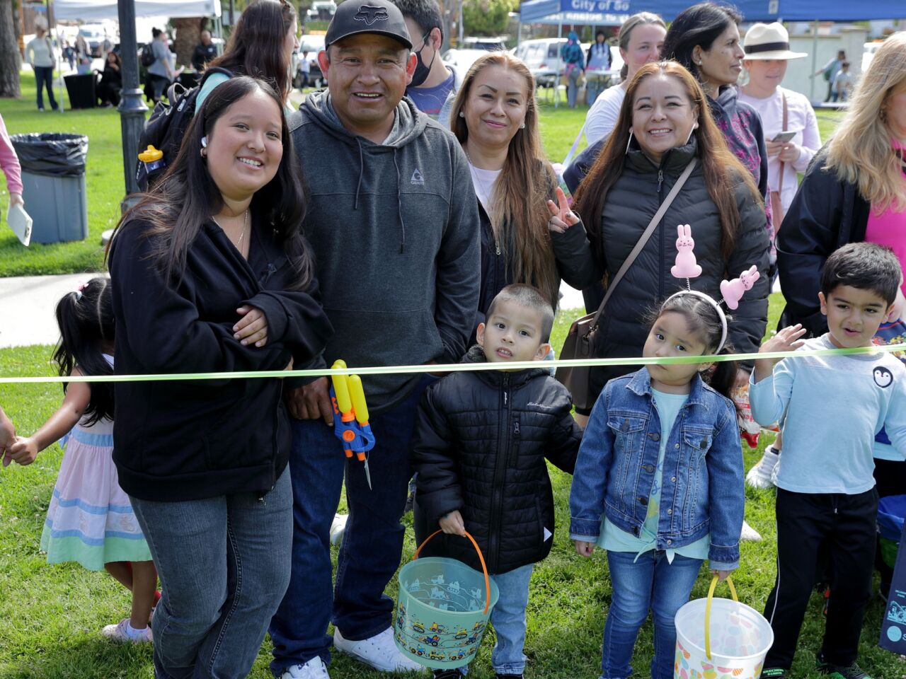 The Aguila family waits for the start of the egg hunt