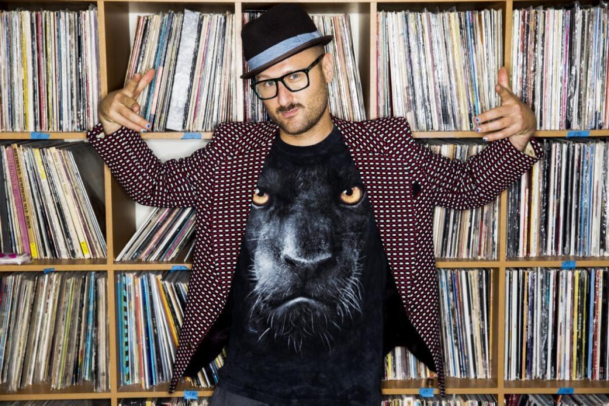 Music producer and DJ Sam Spiegel (a.k.a. Squeak E. Clean) with some of his record collection in his Los Angeles-area home.
