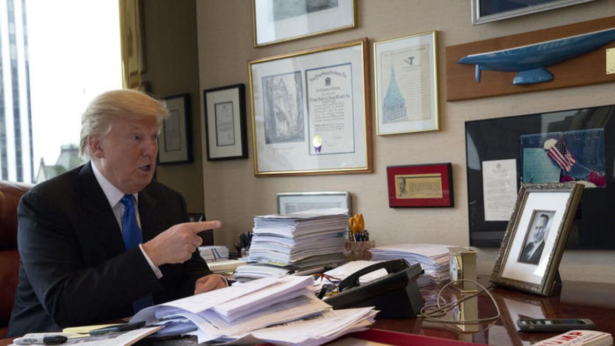 Donald Trump speaks during an interview with the Associated Press in his office at Trump Tower in New York on May 10.