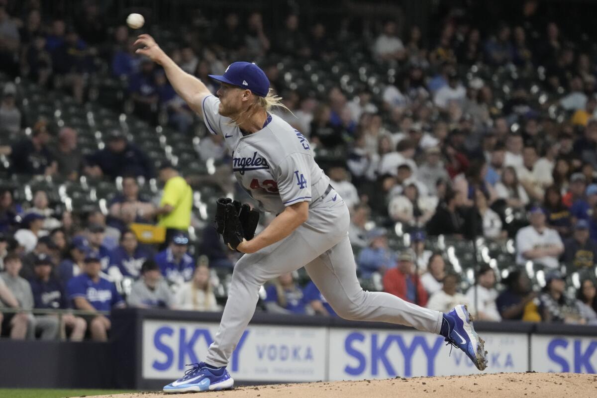 Dodgers pitcher Noah Syndergaard throws during the first inning against the Milwaukee Brewers in Milwaukee.