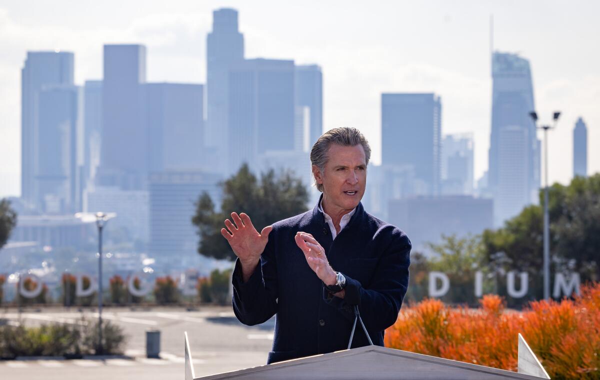 Gov. Gavin Newsom speaks at a lectern.