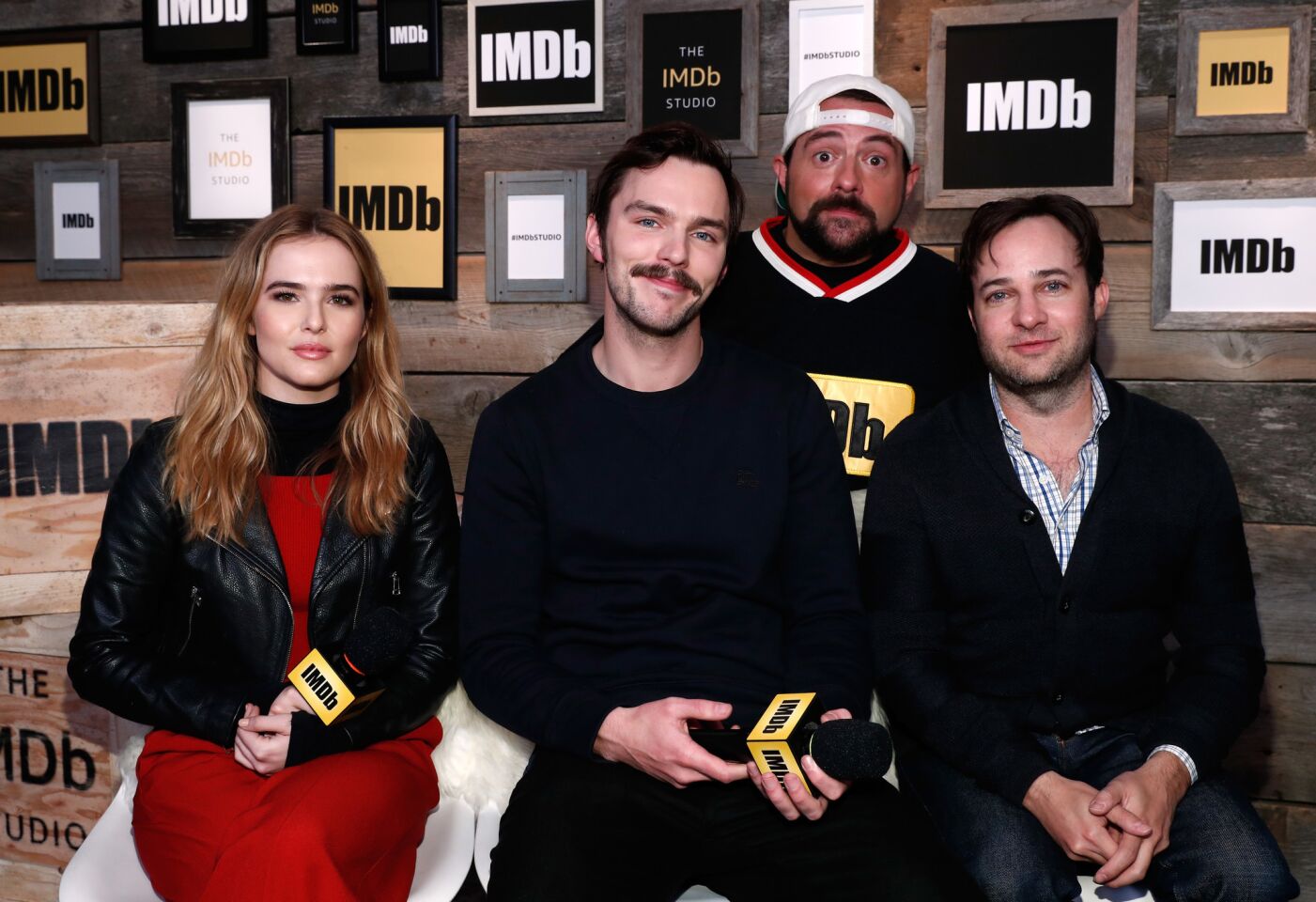 Actors Zoey Deutch and Nicholas Hoult, director Danny Strong of "Rebel in the Rye" and Kevin Smith, top, attend the IMDb Studio featuring the Filmmaker Discovery Lounge.