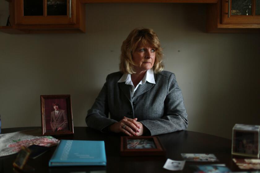 Jolene Burdge poses at her home on April 6, 2016, in Billings, Mont. She said her brother, Stephen Reinboldt, was sexually abused by former U.S. House Speaker Dennis Hastert when Reinboldt was a student and Hastert was a wrestling coach and teacher at Yorkville High School. Burdge is expected to give a victim-impact statement at Hastert's sentencing.