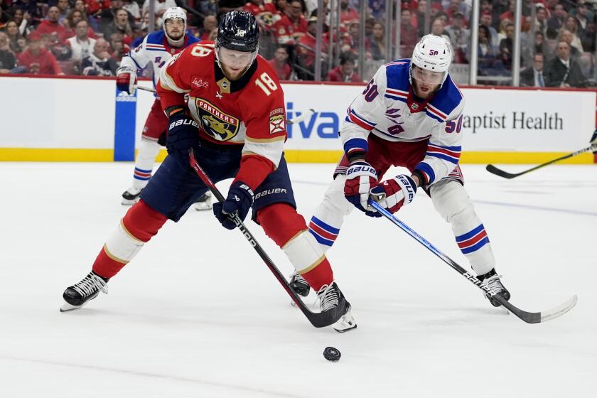 Florida Panthers center Steven Lorentz (18) skates with the puck as New York Rangers.