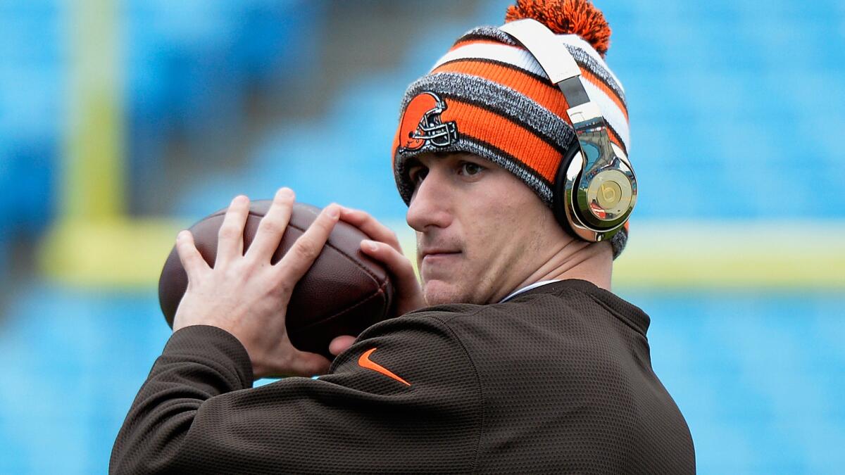 Cleveland Browns quarterback Johnny Manziel warms up before a game against the Carolina Panthers on Dec. 21, 2014.