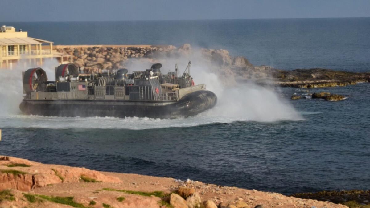A U.S. amphibious hovercraft departs with evacuees from Janzour, Libya, west of Tripoli, on April 7, 2019.