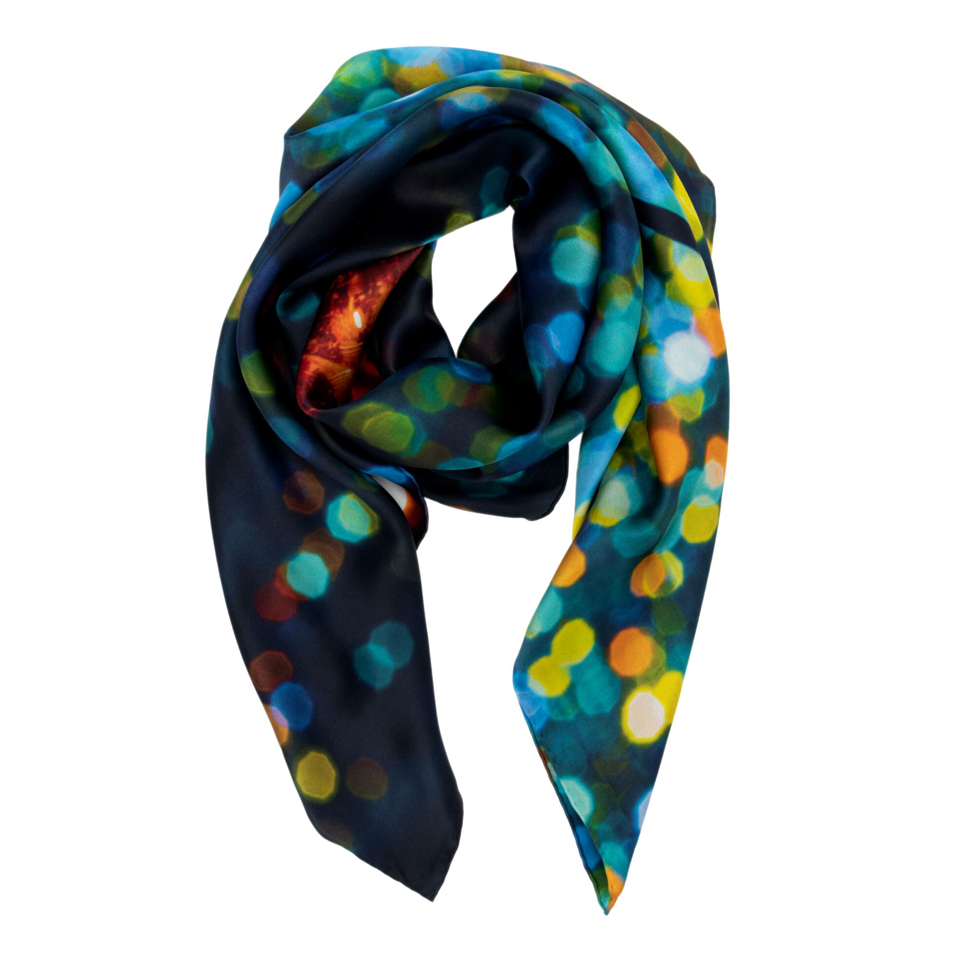 A colorful silk scarf decorated with multicolored dots