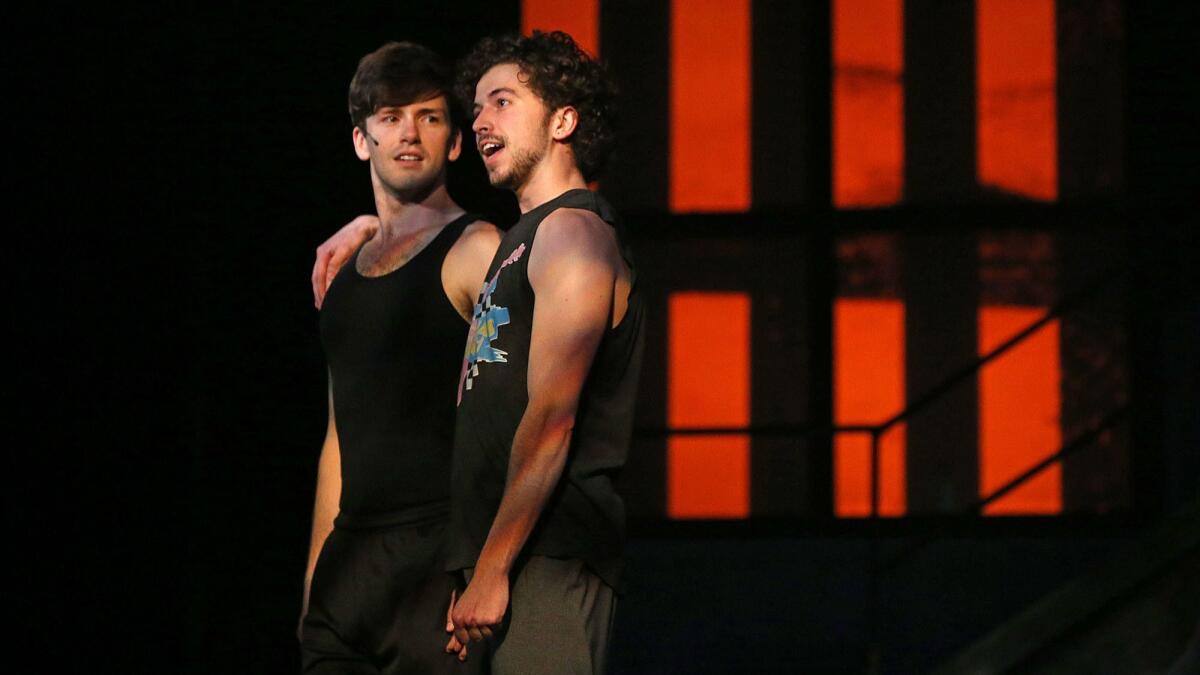 Cast members rehearse a scene from "American Idiot" at UCI's Claire Trevor Theater.