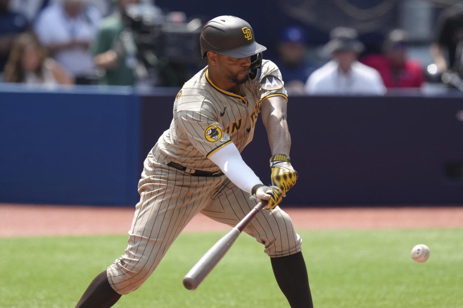 July 20, 2023, TORONTO, ON, CAN: San Diego Padres relief pitcher Luis Garcia  react after hitting