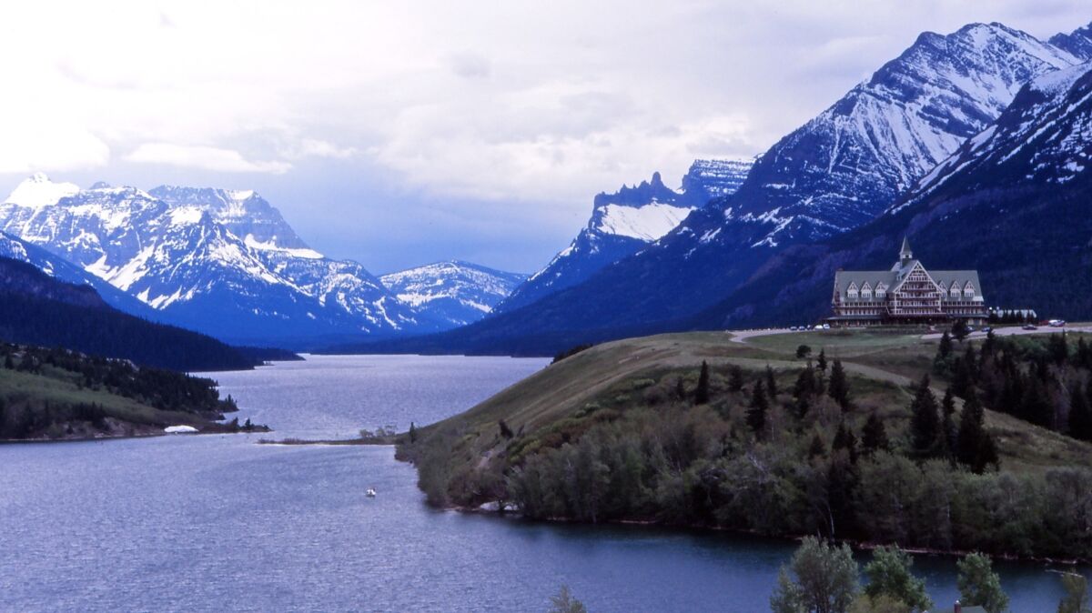 The Prince of Wales Hotel, part of Canada's Waterton Lakes National Park, stands just north of the border from Montana's Glacier National Park.