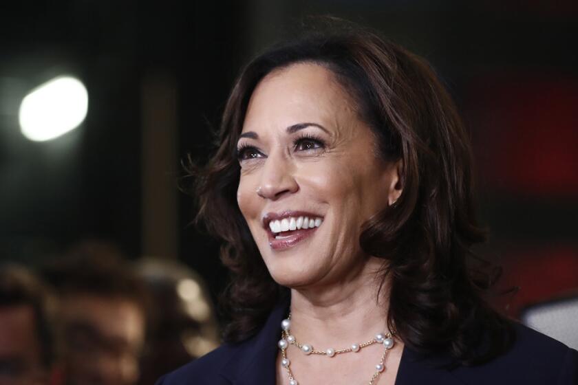 Democratic presidential candidate Sen. Kamala Harris, D-Calif., listens to questions after the Democratic primary debate hosted by NBC News at the Adrienne Arsht Center for the Performing Art, Thursday, June 27, 2019, in Miami. (AP Photo/Brynn Anderson)