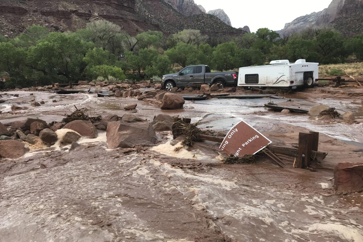In this photo provided by the National Park Service is the scene after a flash flood in Zion National Park, Utah on Tuesday, June 29, 2021. Zion National Park reopened with modified operations Wednesday after a flash flood swept through portions of southern Utah. Park officials are urging visitors to exercise caution and to expect delays as clean up efforts continue and damage is assessed following Tuesday's flood. (National Park Service via AP)