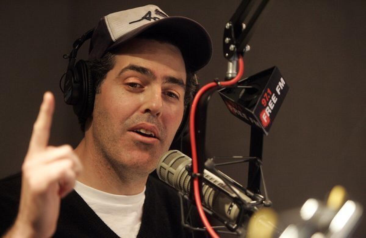 Talk radio host Adam Carolla in the Infinity radio studios in Hollywood in January 2006, is the subject of a civil suit brought by three former business associates.