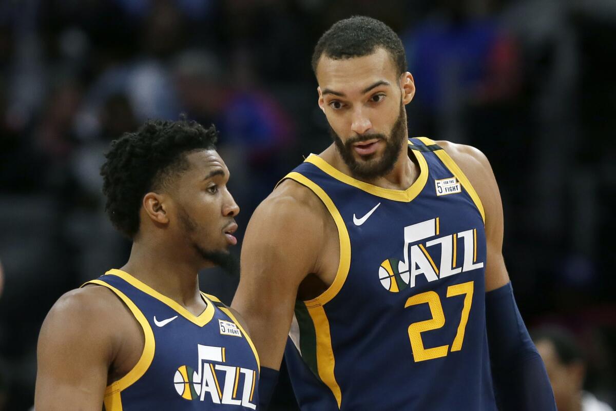 Jazz center Rudy Gobert (27) and guard Donovan Mitchell have both tested positive for COVID-19 as the coronavirus outbreak became a pandemic.