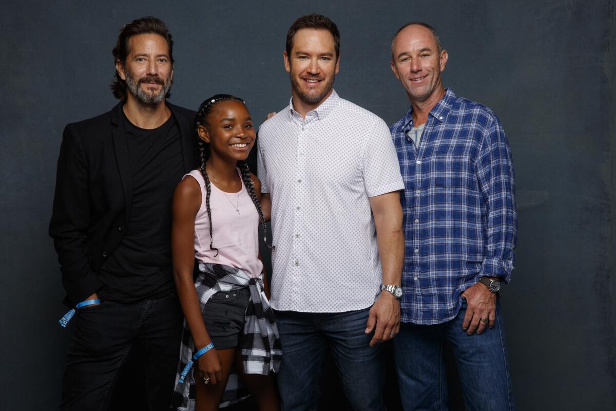 Henry Ian Cusick, from left, Saniyya Sidney, Mark-Paul Gosselaar and Jamie McShane from the television series "The Passage."