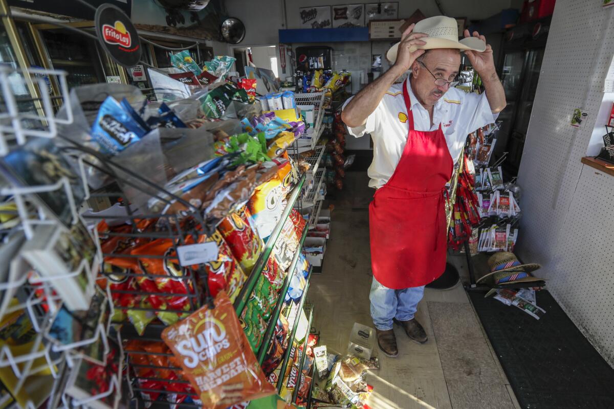 Gas station owner Roger Sandoval faces the possibility of having to shut his Trona business after a 7.1 earthquake apparently damaged the supply tanks near the pumps. (Robert Gauthier / Los Angeles Times)