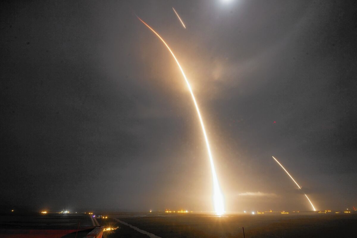 Making rockets reusable has long been a goal of aerospace engineers because of its potential to greatly reduce the cost of space travel. Above, a time-lapse photo of the launch, re-entry and landing of SpaceX's Falcon 9 at Florida's Cape Canaveral.