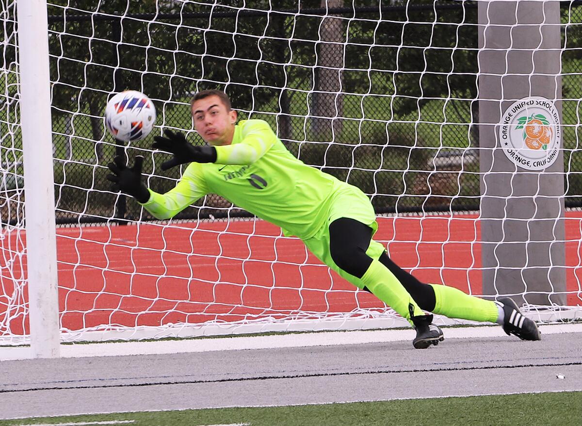 Newport Harbor goalkeeper Jack Shepherd (0) dives for a save against Foothill on Saturday in the CIF Division 2 final.