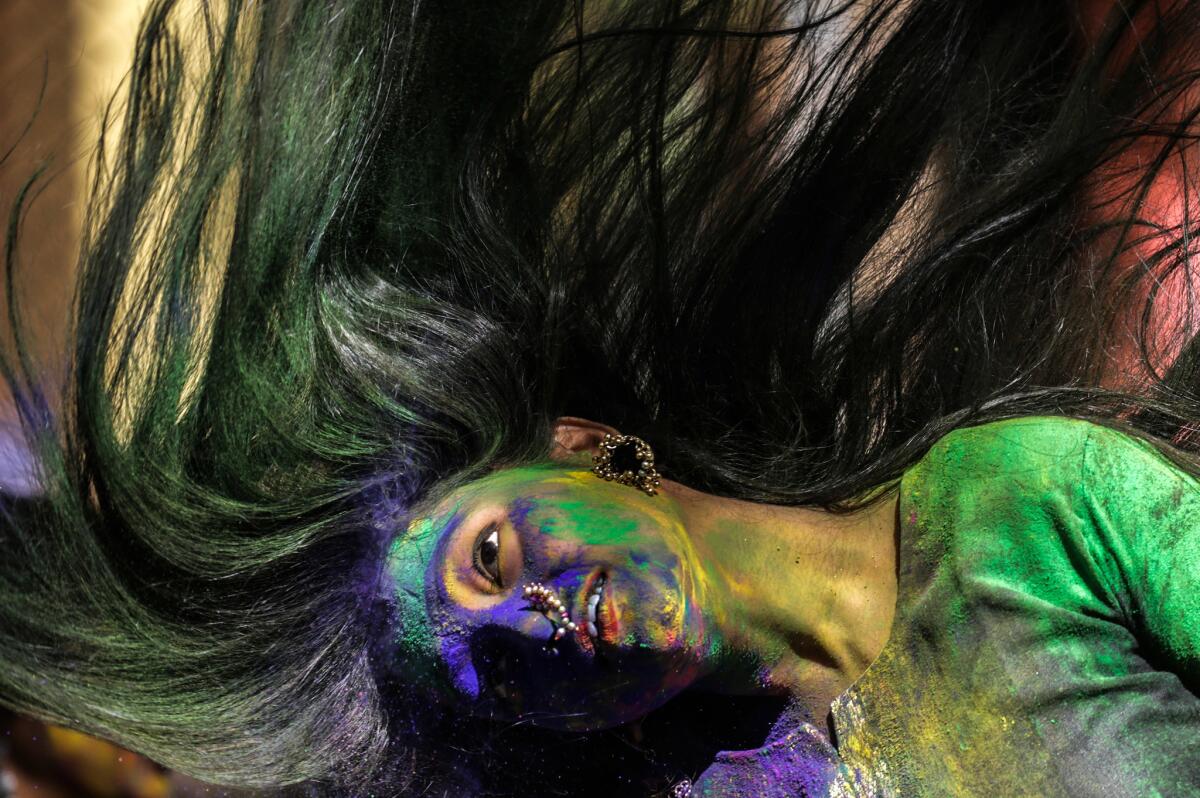 An Indian Holi reveler in Mumbai, India. (Divyakant Solanki EPA/Shutterstock)