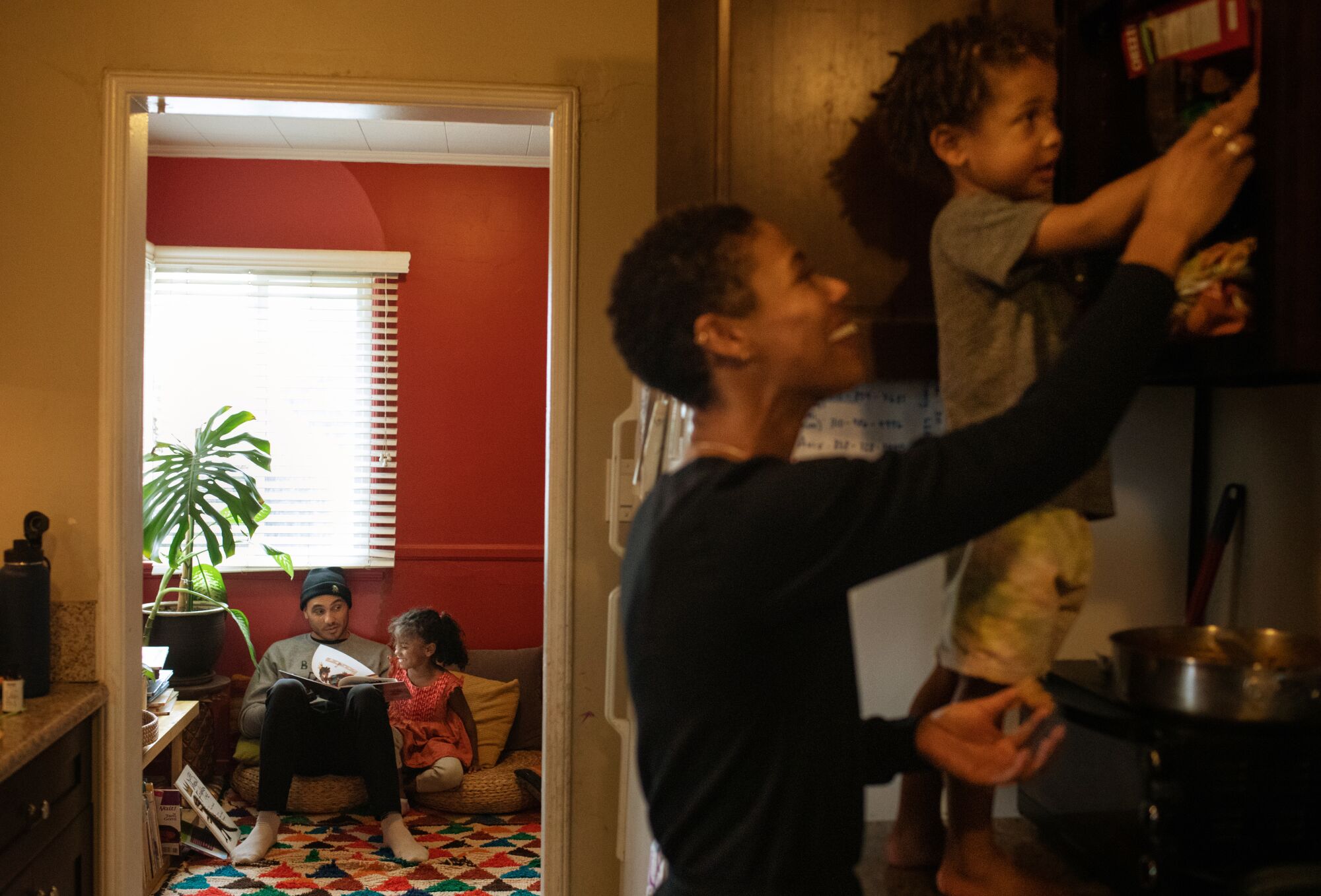 Bobby Brown reads a book to his daughter Echo, 5