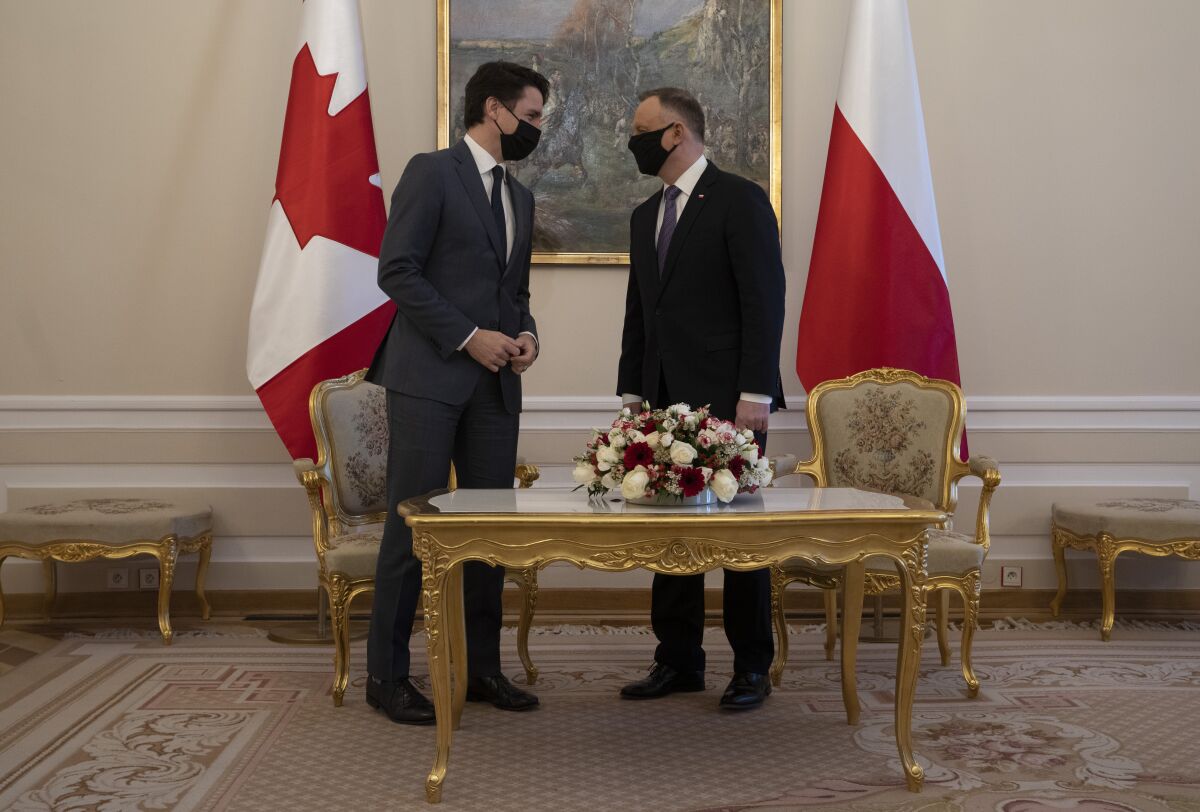 Canadian Prime Minister Justin Trudeau meets with Polish President Andrzej Duda at the palace in Warsaw, Poland, Thursday, March 10, 2022. (Adrian Wyld/The Canadian Press via AP)