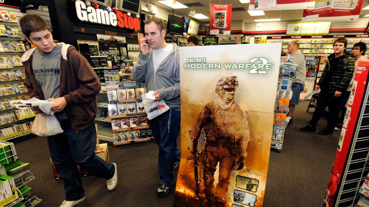Gamers get copies of "Call of Duty: Modern Warfare 2" at a GameStop store in Las Vegas in 2009.