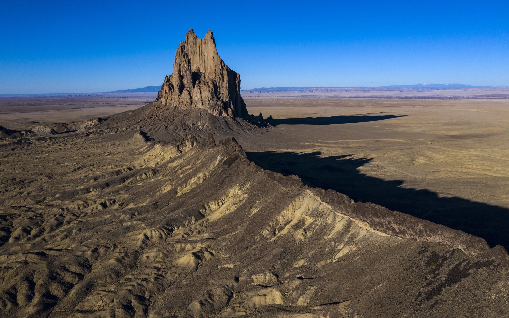 The Shiprock formation rises nearly 1,583 feet above the high-desert plain of the Navajo Nation. 