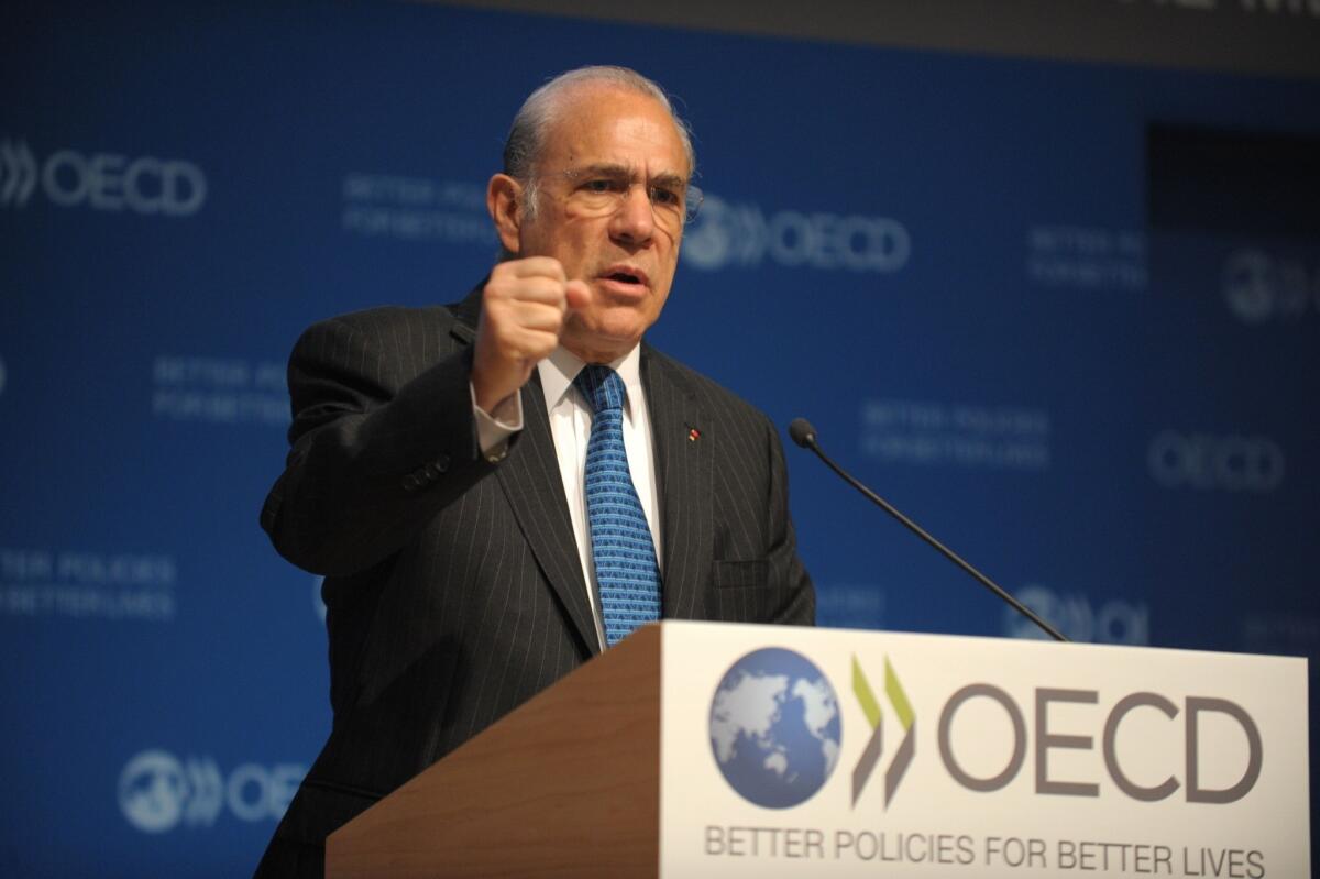Angel Gurria, secretary-general of the Organization for Economic Cooperation and Development, at a news conference in Paris.