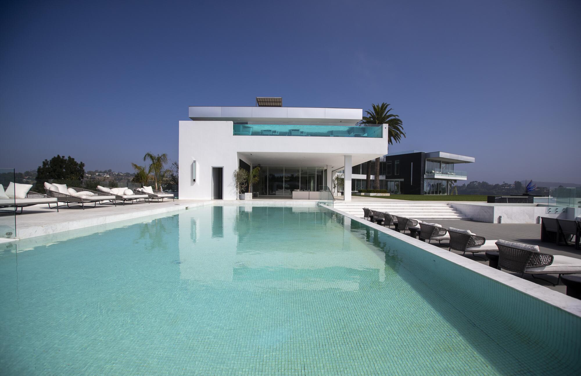 A view of a pool with a 4,000-square-foot bedroom above it at The One.