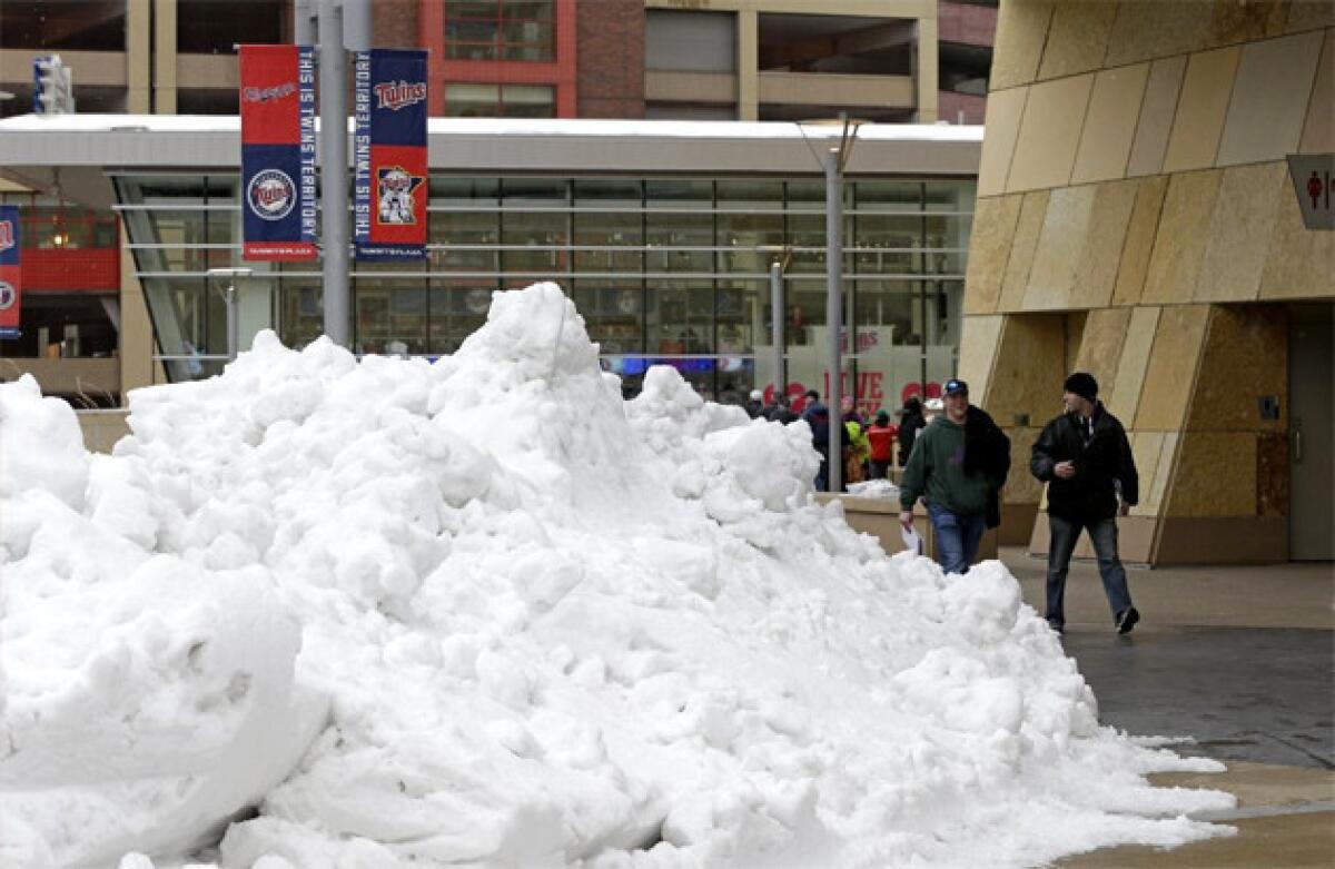 There are still snow drifts around the city, and Monday's forecast calls for temperatures of 39 degrees.
