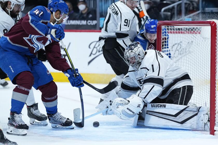 Colorado Avalanche center Pierre-Edouard Bellemare (41) scores a goal against Los Angeles Kings goaltender Troy Grosenick (1) during the second period of an NHL hockey game Thursday, May, 13, 2021, in Denver. (AP Photo/Jack Dempsey)