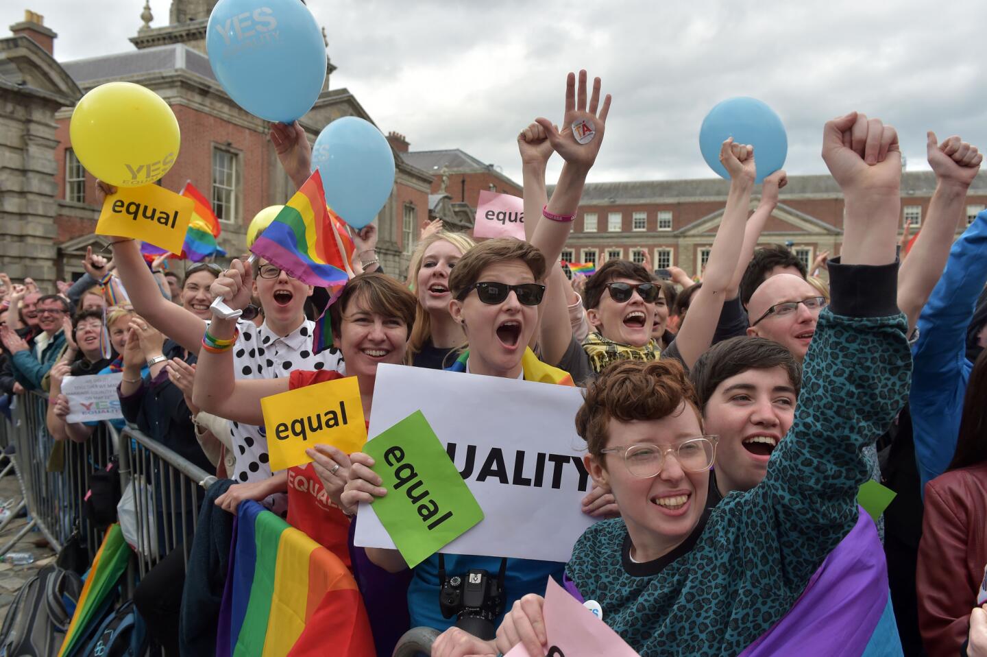 The crowd at Dublin Castle Square cheers as the result of the same-sex marriage referendum is relayed. Ireland voted in favor.