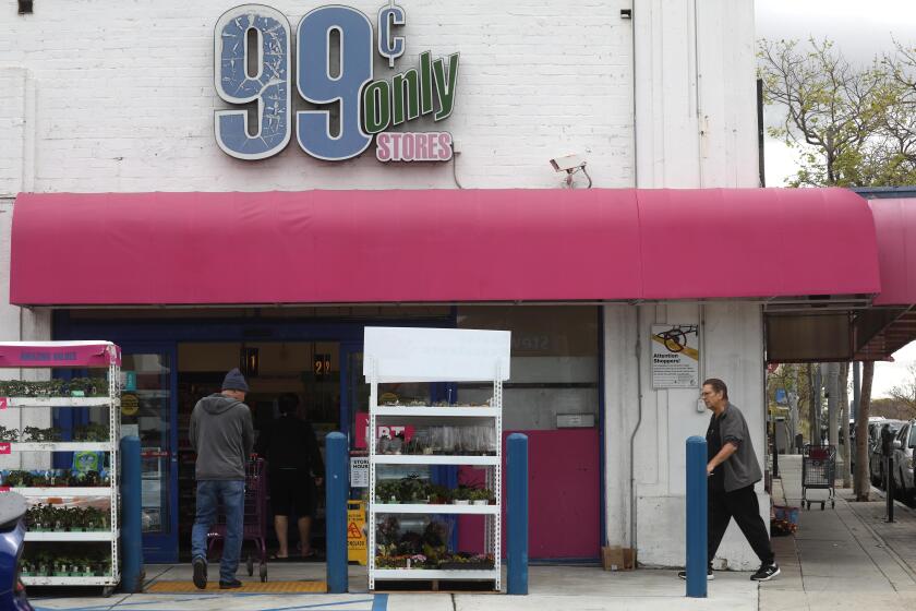 SANTA MONICA, CA - APRIL 5, 2024 - - Shoppers make their way into the 99 Cent Only store in Santa Monica on April 5, 2024. The stores will be closing soon. (Genaro Molina/Los Angeles Times)